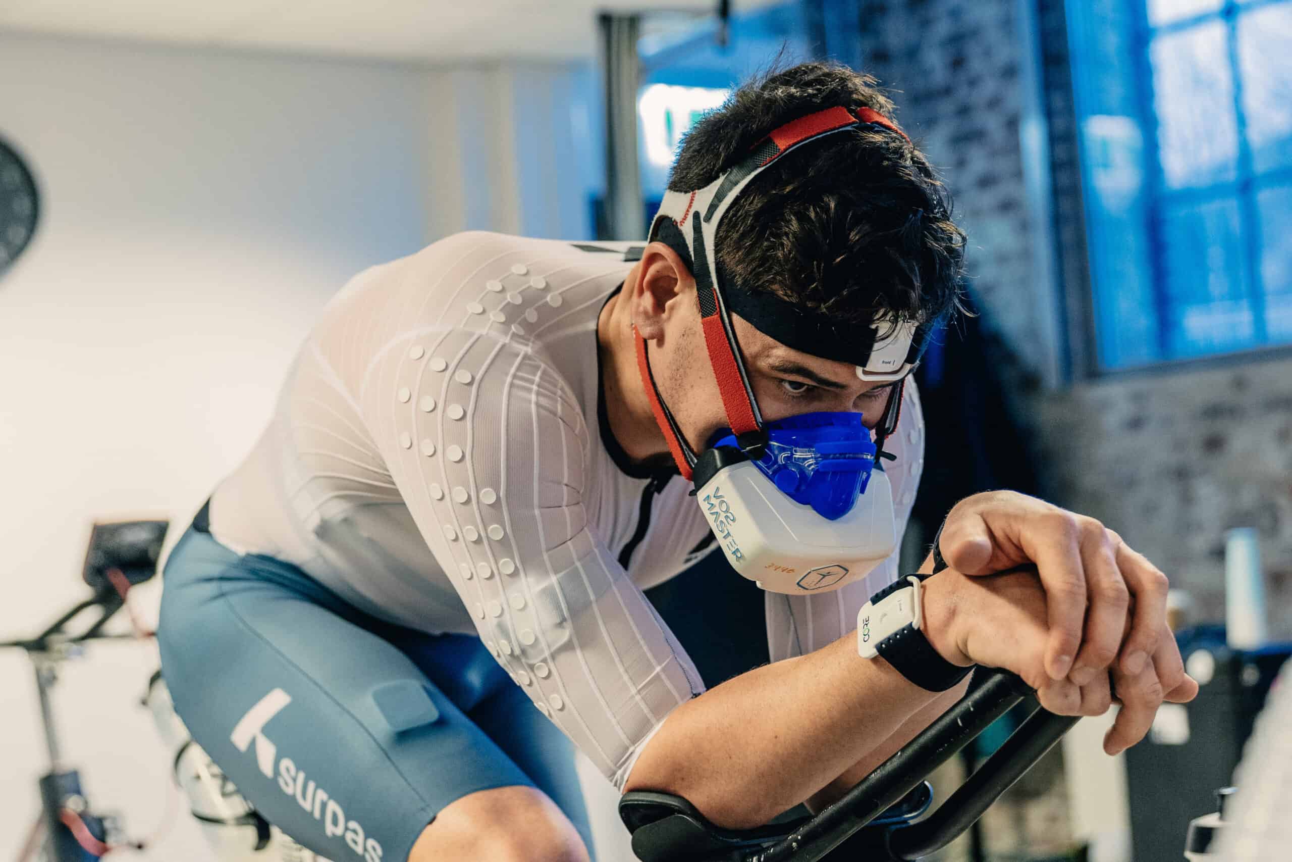 Man on a stationary bike indoors with VO2 Master Analyzer