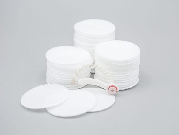 filter disc stack on gray background