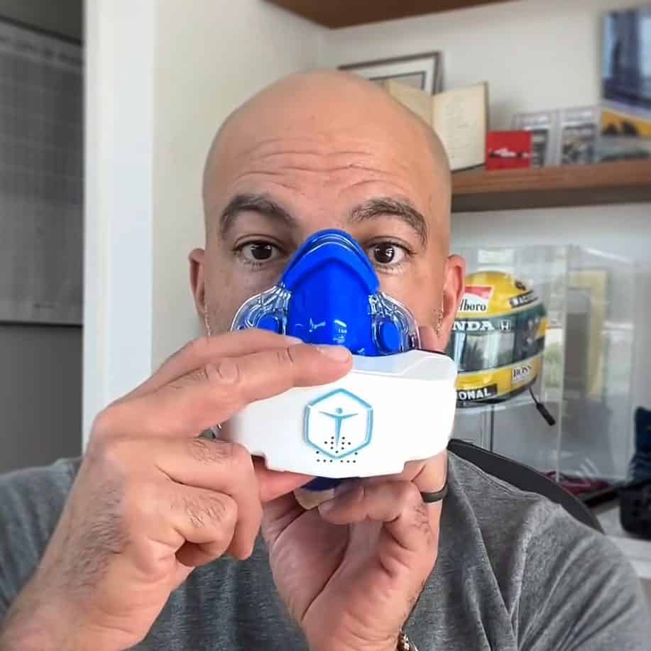 peter attia on his podcast the drive demonstrating the vo2 master portable analyzer