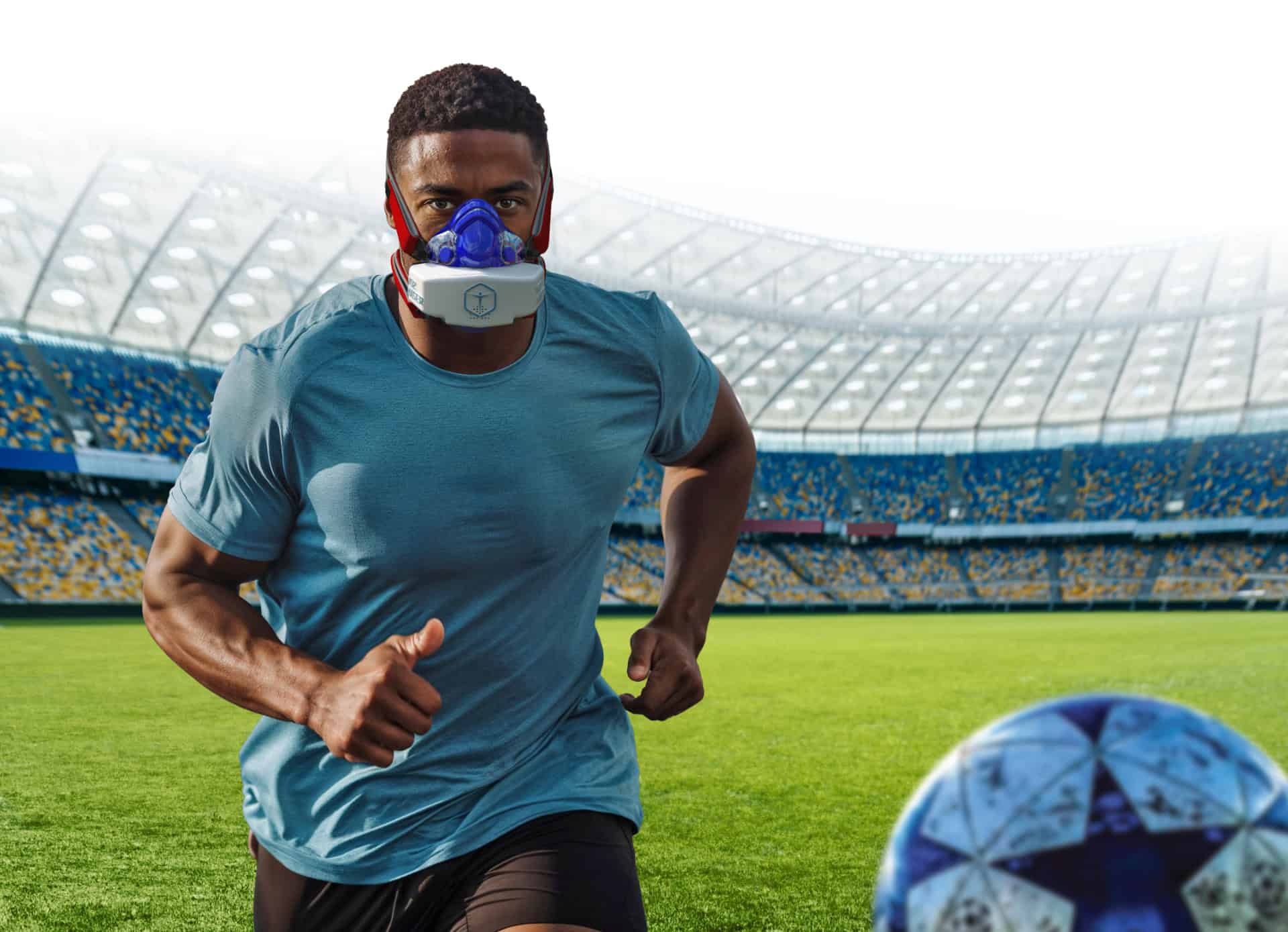 A pro football player wearing VO2 Master during training for metabolic analysis