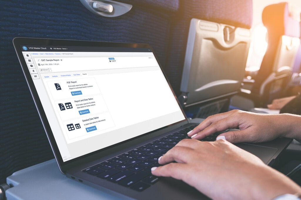 a woman accessing vo2 master cloud remotely in airplane