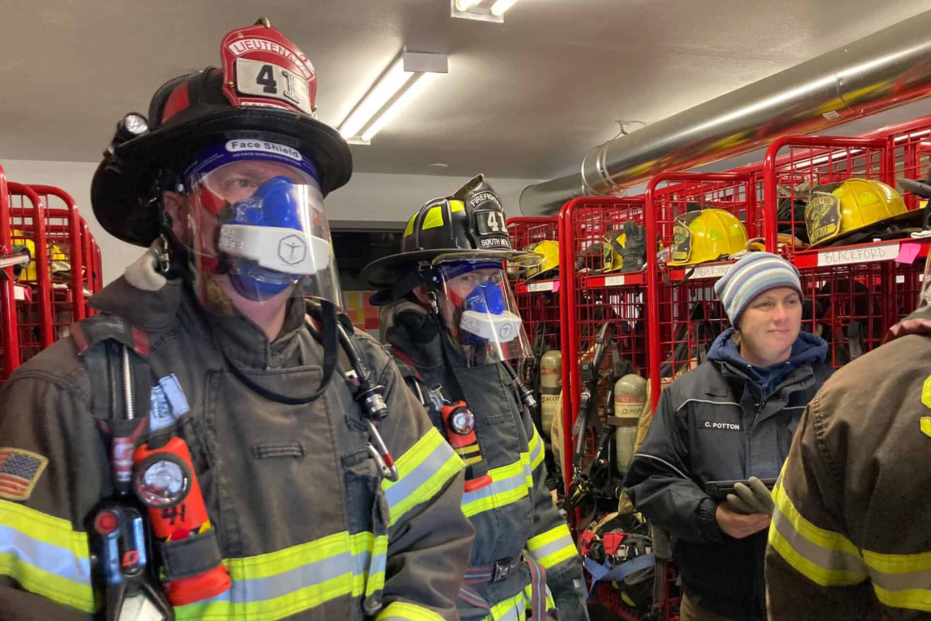 Firefighters in equipment wearing VO2 Master